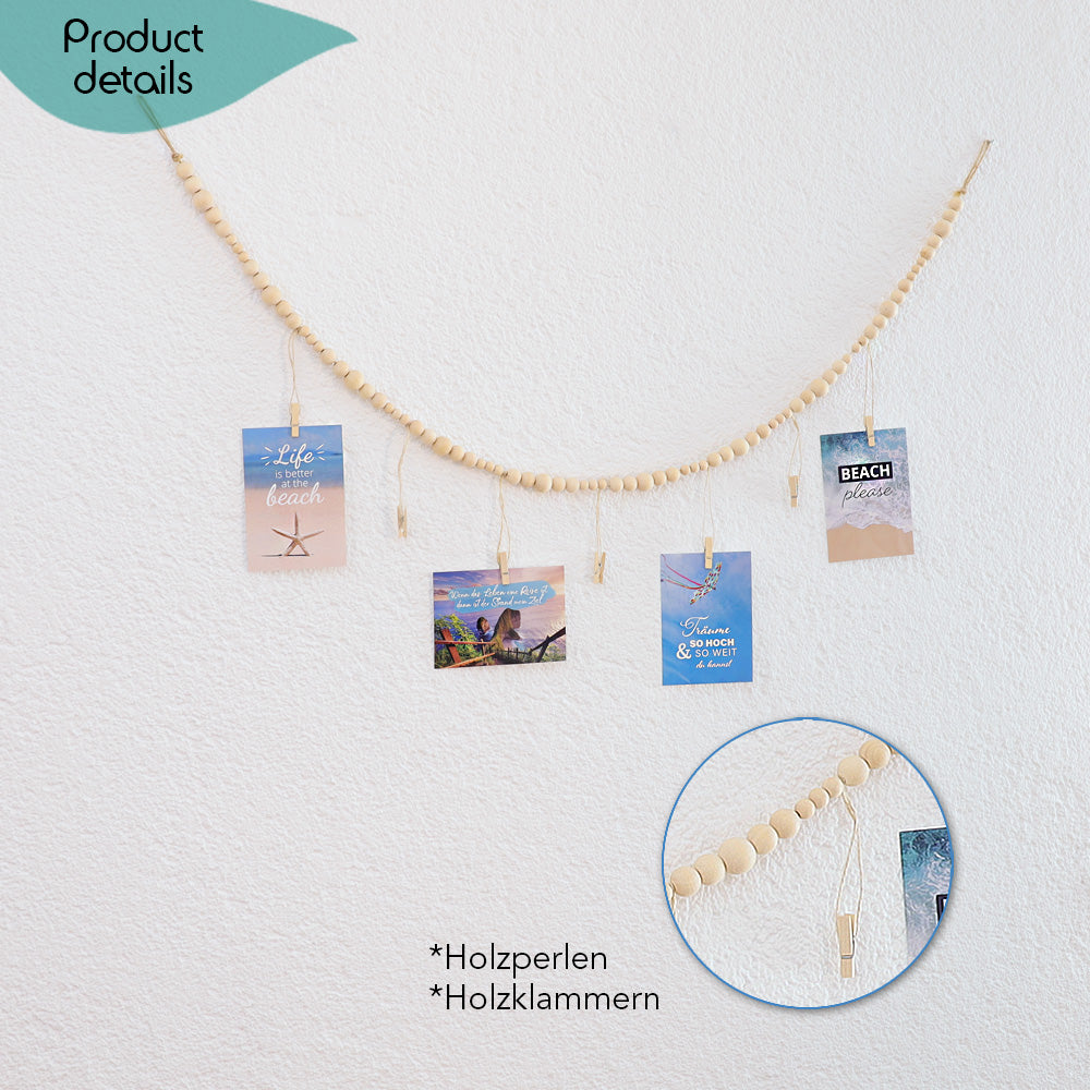 DECCARO Fotoaufhänger Cord, Fotoaufhänger aus einer hellen horizontalen Baumwollschnur auf die hellen Holzperlen aufgereiht sind. An dieser Schnur sind sechs vertikal ausgerichtete Baumwollschnüre mit Holzperlen und kleinen Holzklammern befestigt, an den Fotos und Postkarten aufgehangen werden können. 