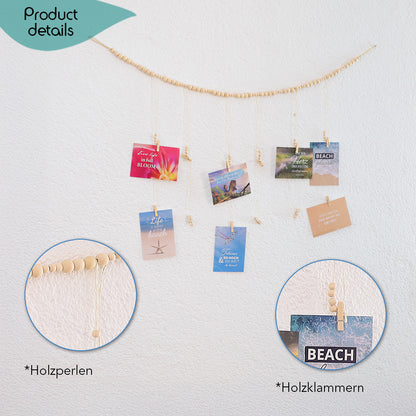 DECCARO Fotoaufhänger Cord, Fotoaufhänger aus einer hellen horizontalen Baumwollschnur auf die hellen Holzperlen aufgereiht sind. An dieser Schnur sind sechs vertikal ausgerichtete Baumwollschnüre mit Holzperlen und kleinen Holzklammern befestigt, an den Fotos und Postkarten aufgehangen werden können. 